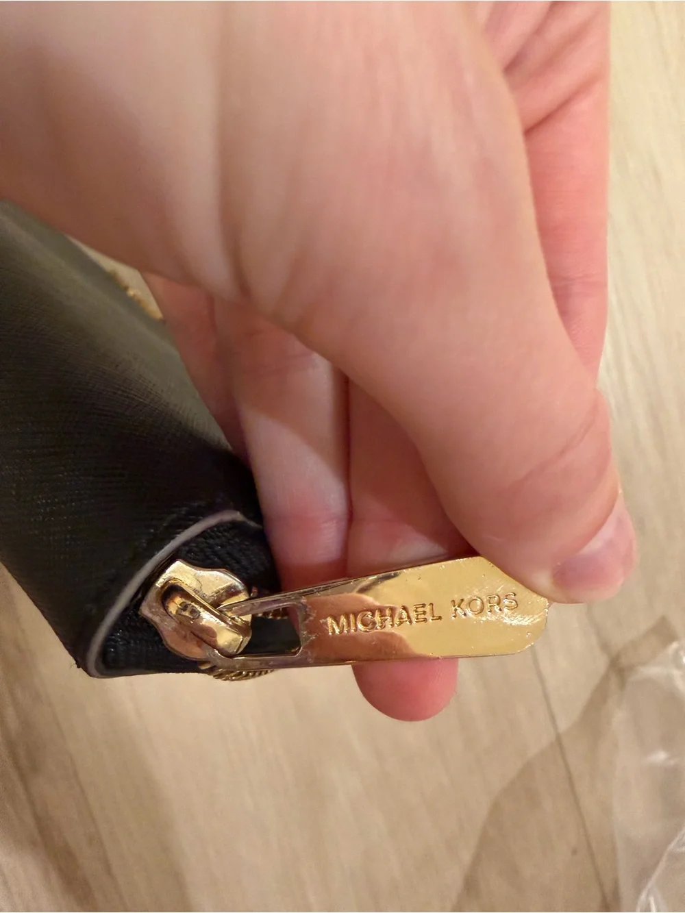 Michael Kors sleek zip